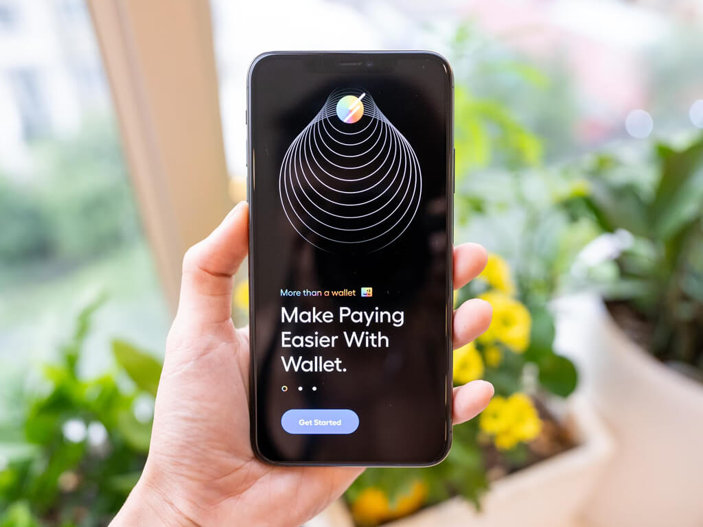 Cosmetic products including a jar, tube, and bottle with black and gold packaging