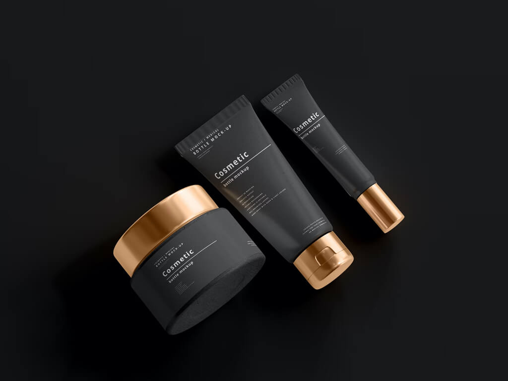 Cosmetic products including a jar, tube, and bottle with black and gold packaging